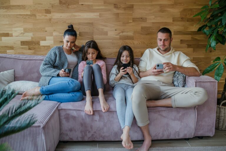 family playing mobile games